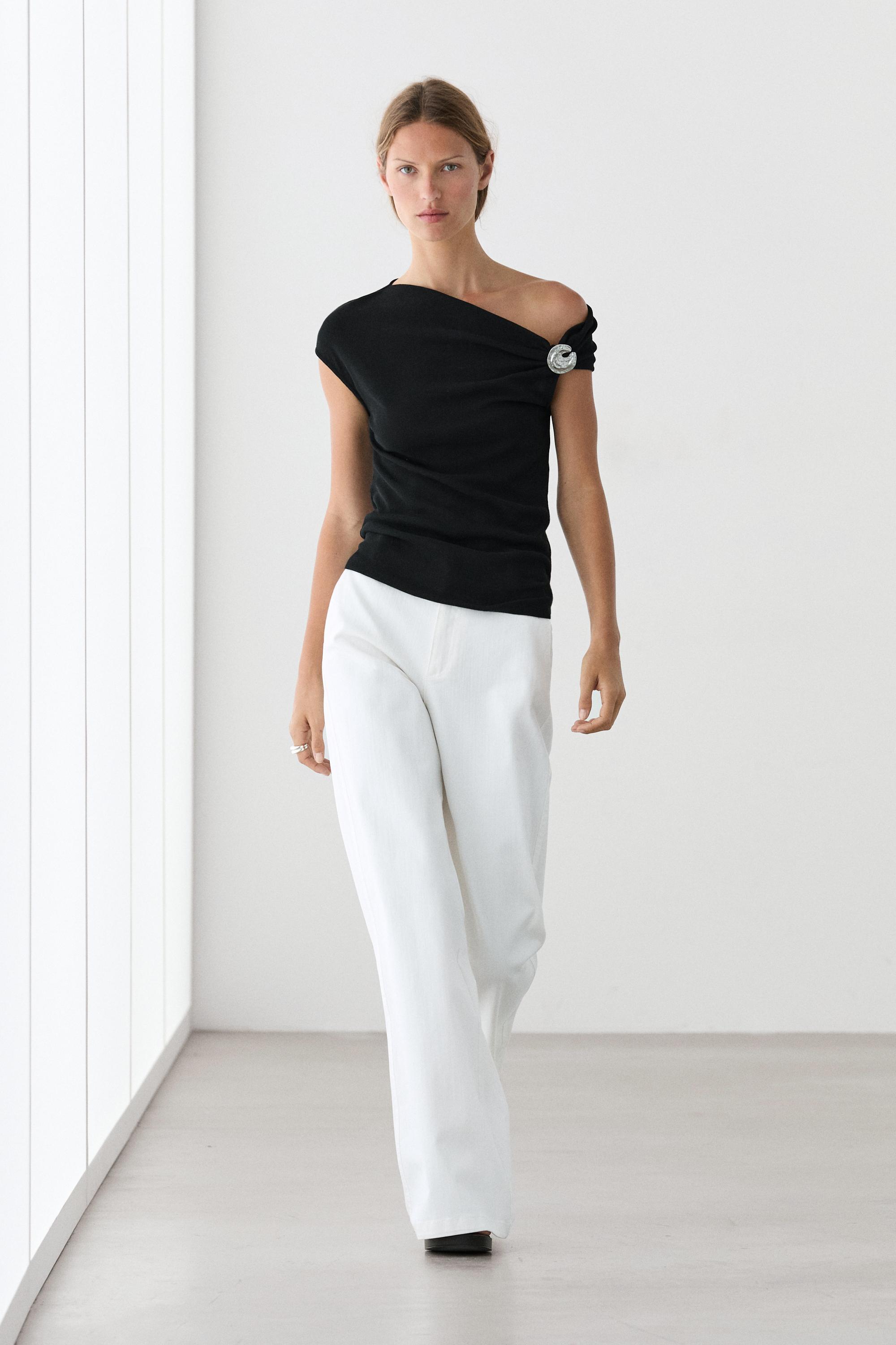 Asymmetric top with rhinestone detail